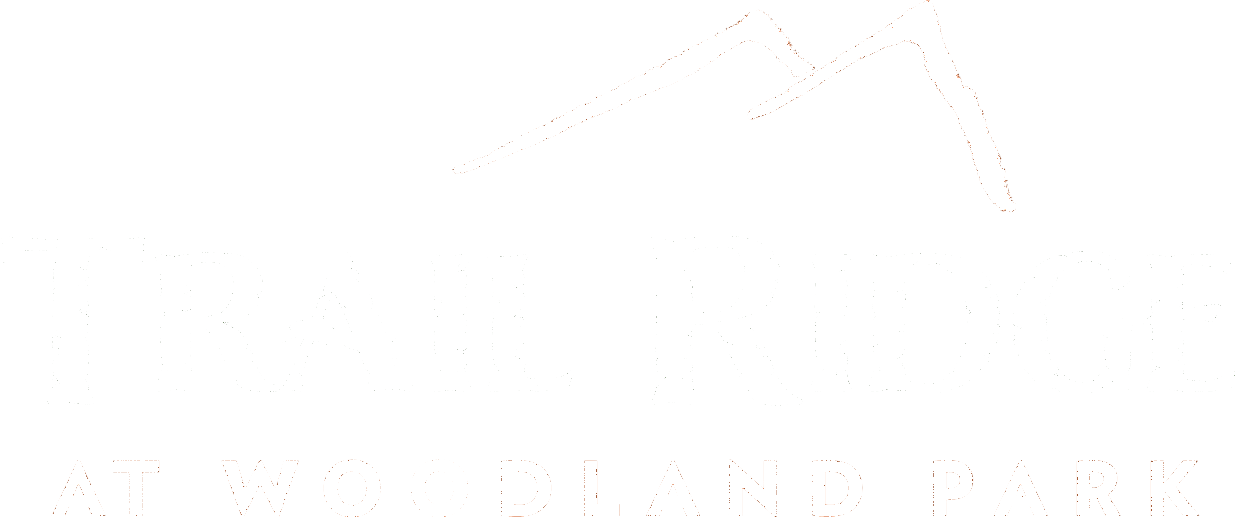 A logo for Trail Ridge at Woodland Park.
